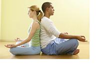 two people meditating